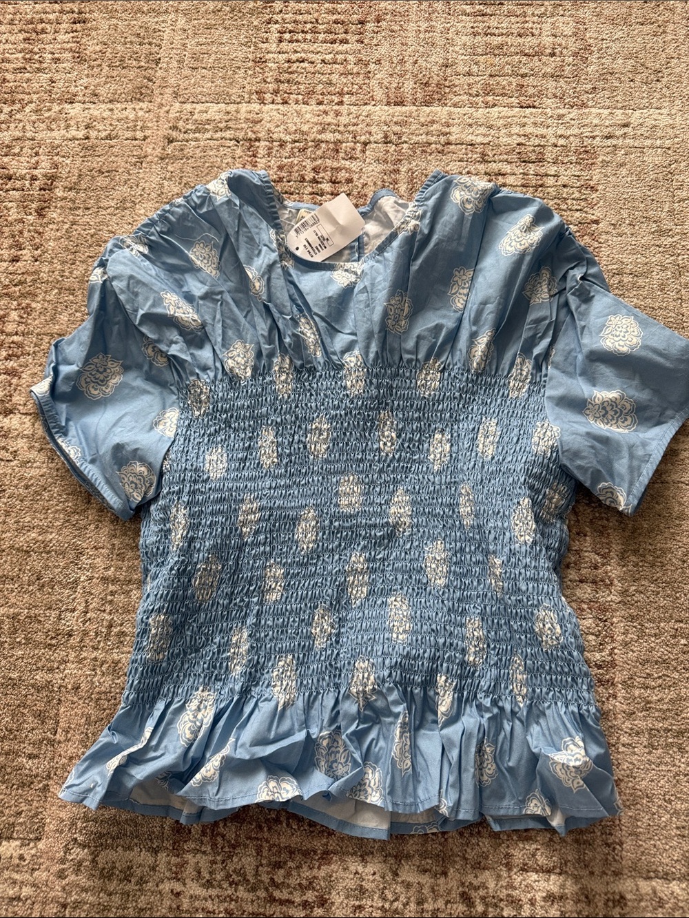 Mynowa Blue Smocked Short Sleeve Blouse with White Medallion Print